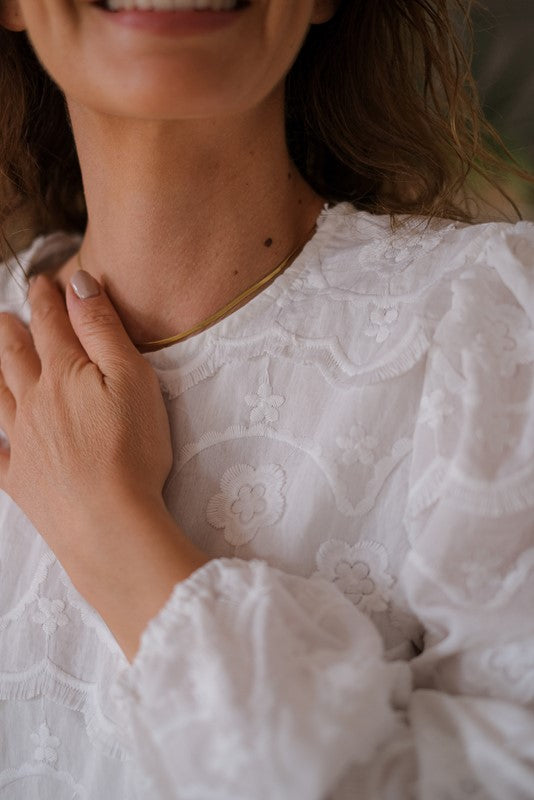 BLUSA PETALI E FRANGE